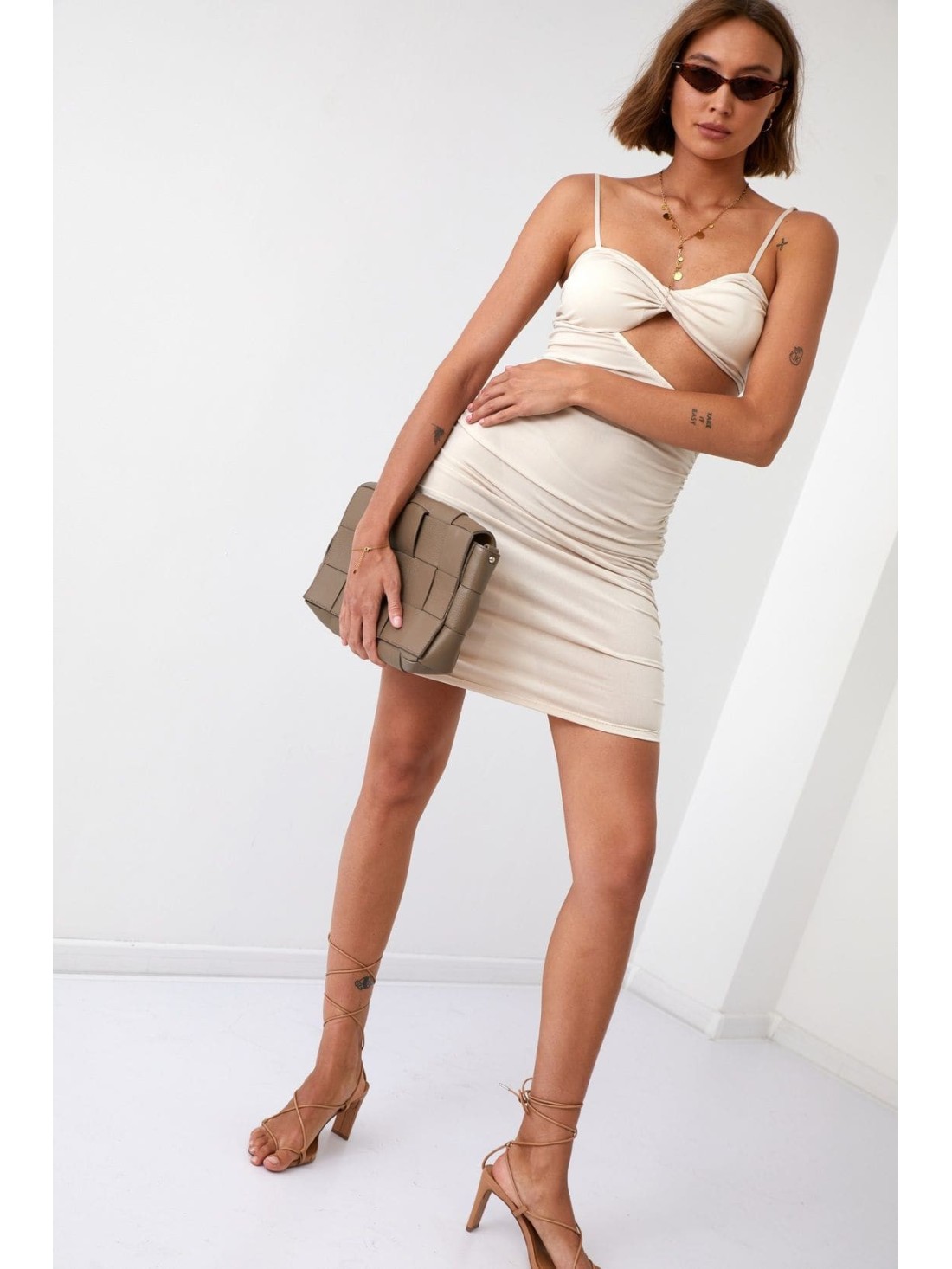 Sensual mini dress with a cutout, beige 22616 - Online store - Boutique